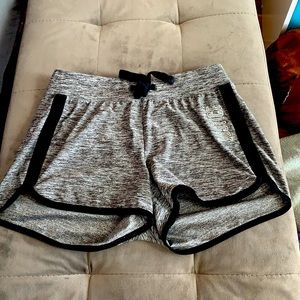 A t-shirt and shorts set (sold together)